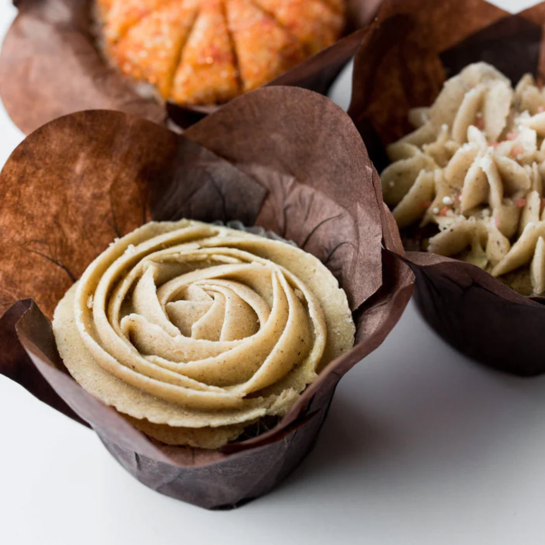 Easy gluten free cupcakes decorated with cinnamon frosting & icing.