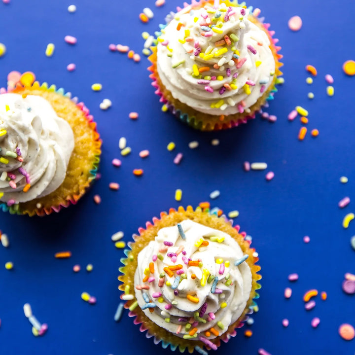 Vanilla buttercream frosting on vanilla bean cupcakes